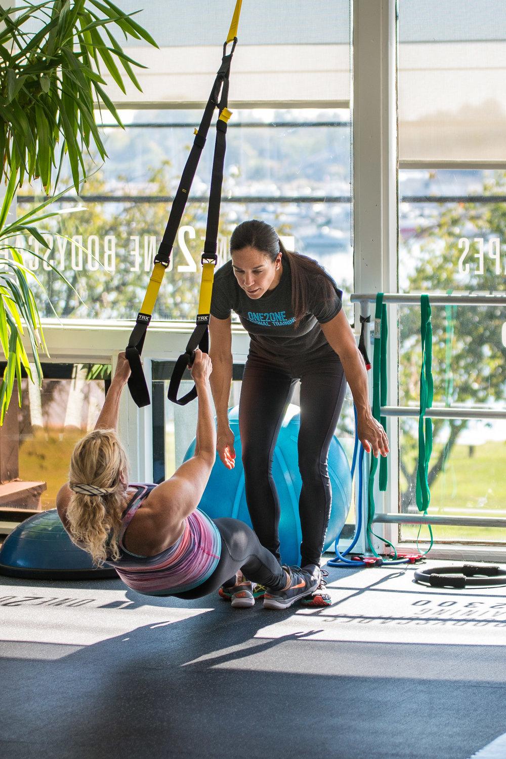 Small group fitness class with instructor leading workout at One2One Fitness Mamaroneck